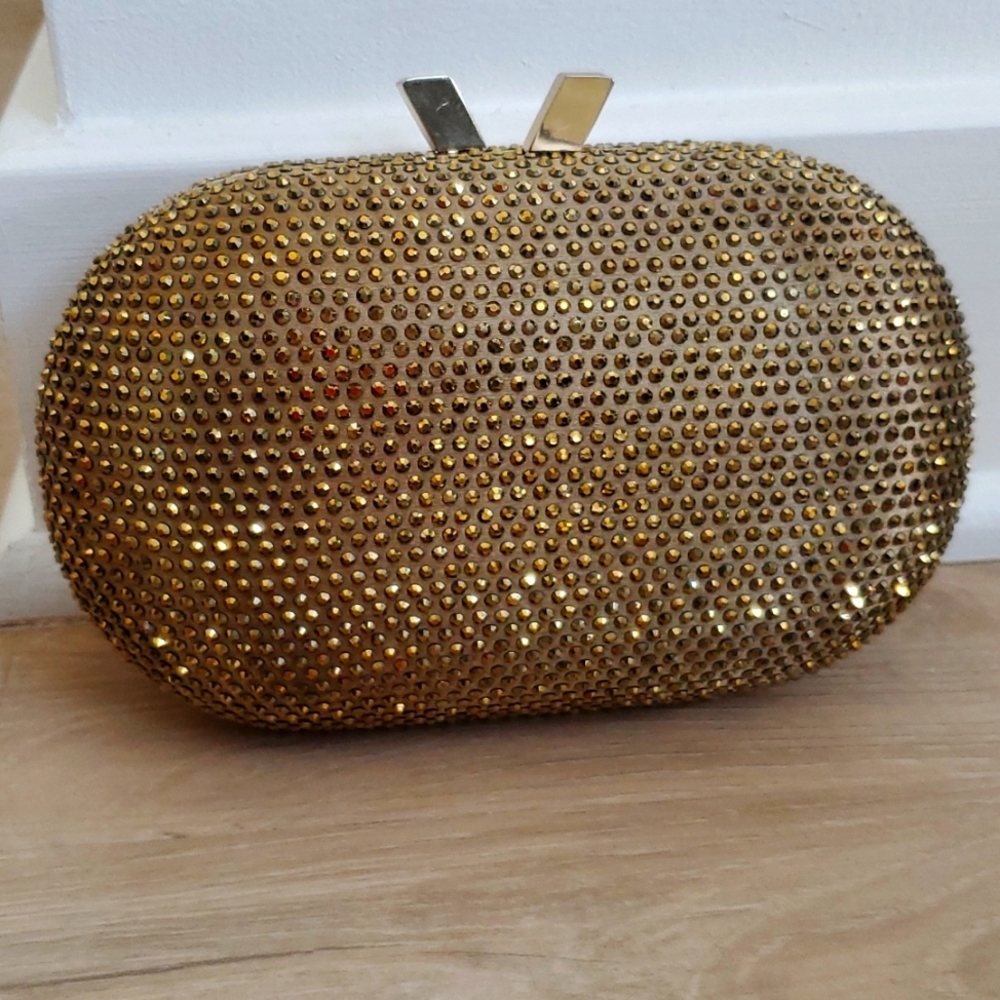 Gold studded clutch